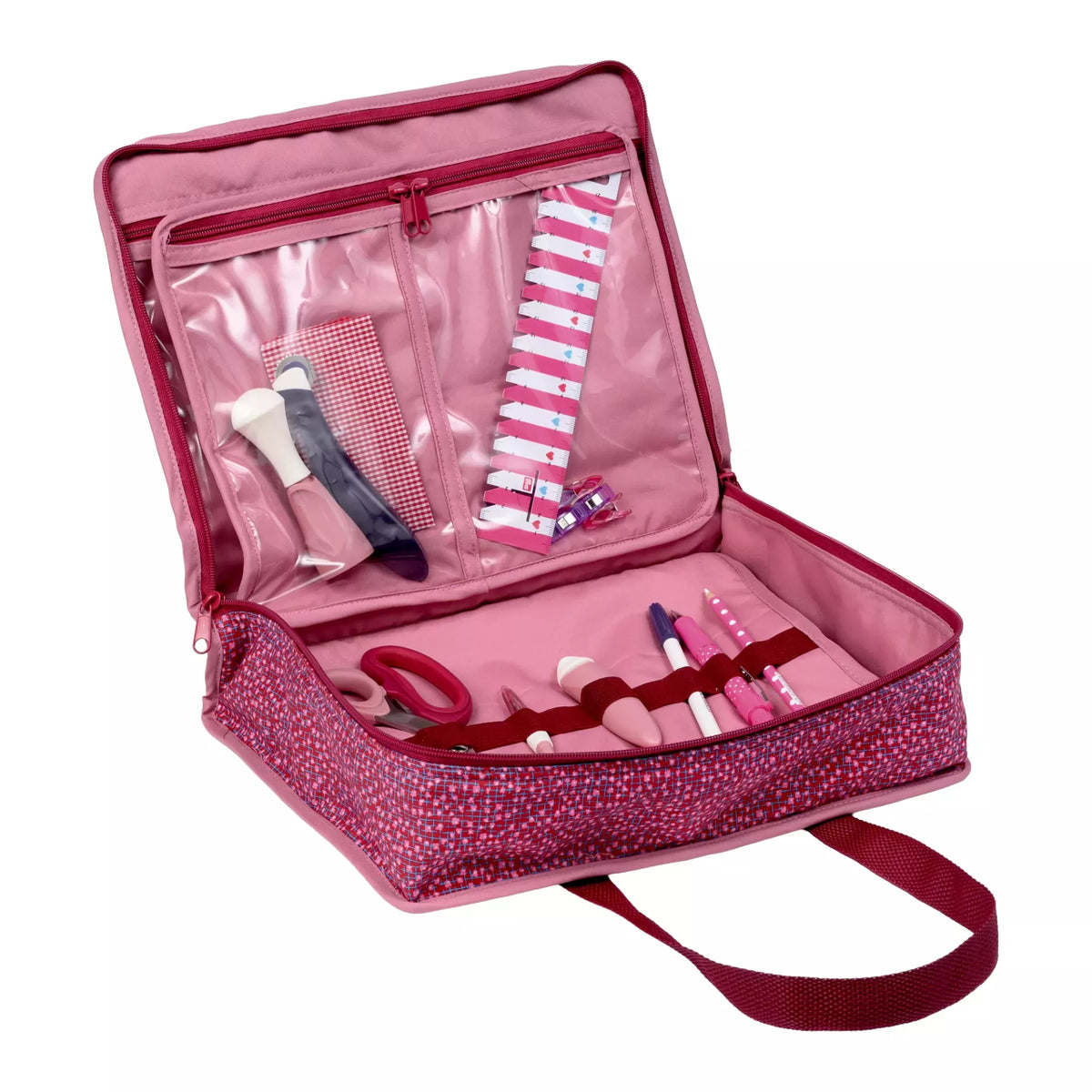 Open burgundy all-in-one craft bag with transparent pockets and loops holding sewing accessories.