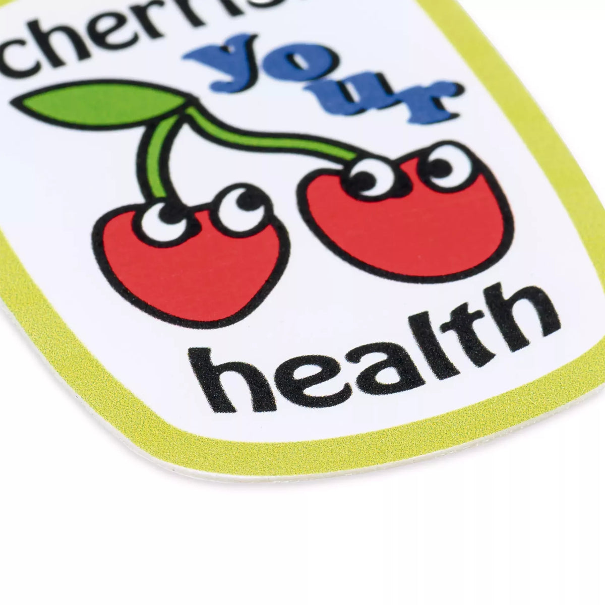Reflective cherry appliqué with 'cherish your health' text and cartoon eyes on red cherries.