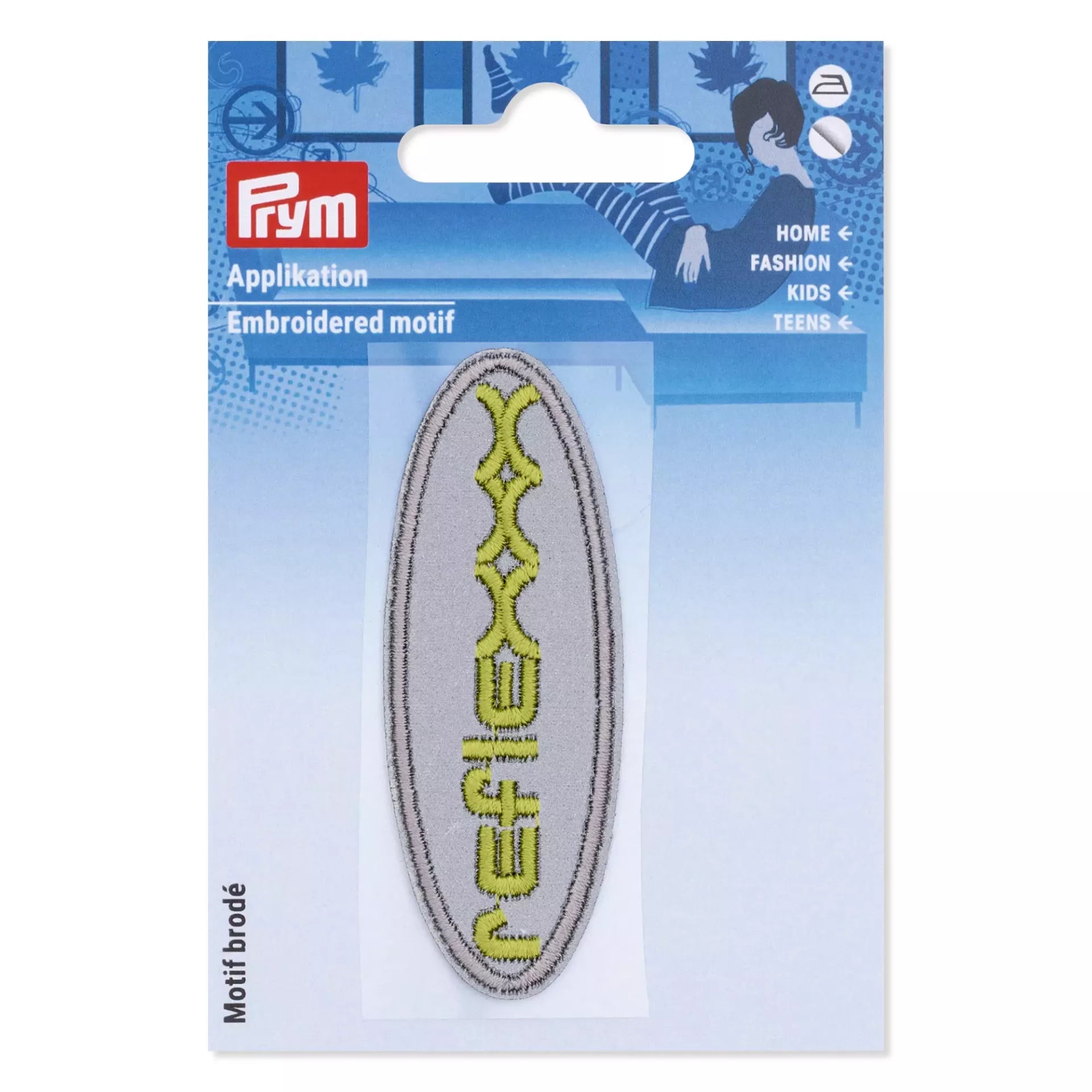 A grey oval iron-on reflective patch with yellow embroidered text on a blue Prym retail card.
