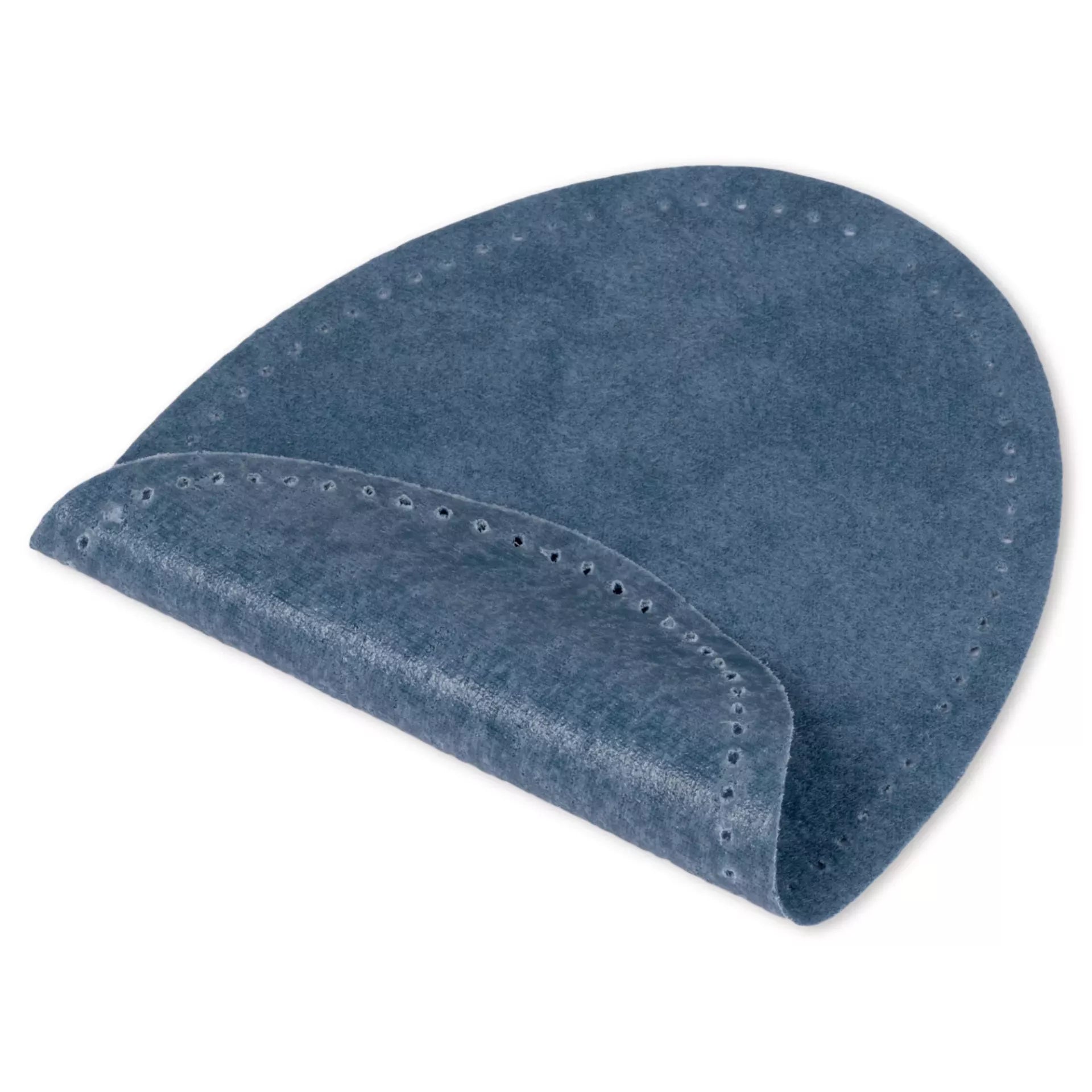 A blue, oval-shaped velour imitation leather patch with pre-punched holes along the edges.