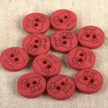 A collection of 15mm red polyester sewing buttons featuring an engraved sheep design.