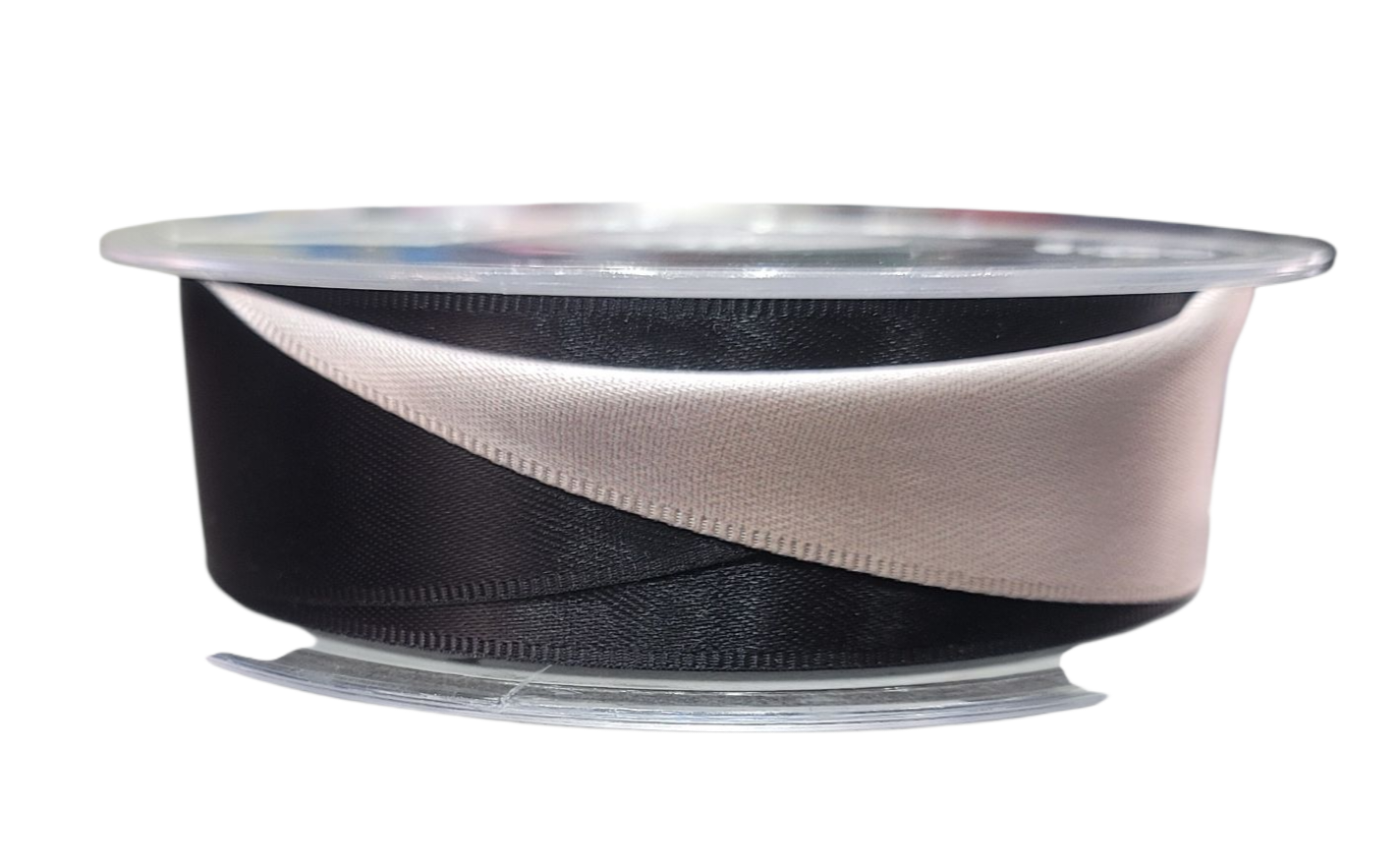 A roll of 25mm wide satin ribbon in black and beige.