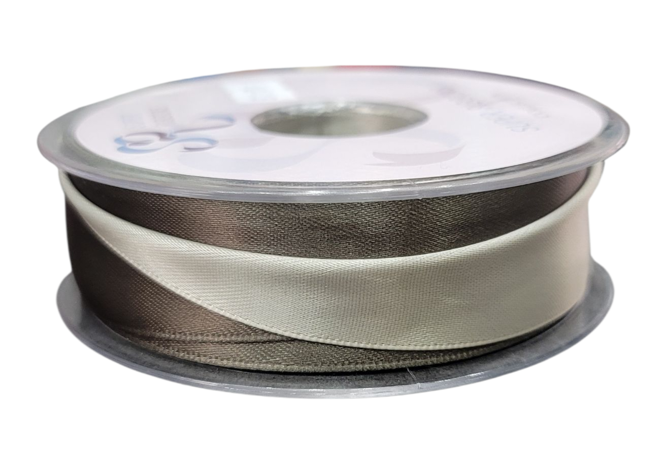 A spool of 25mm wide satin ribbon in a combination of two colors.