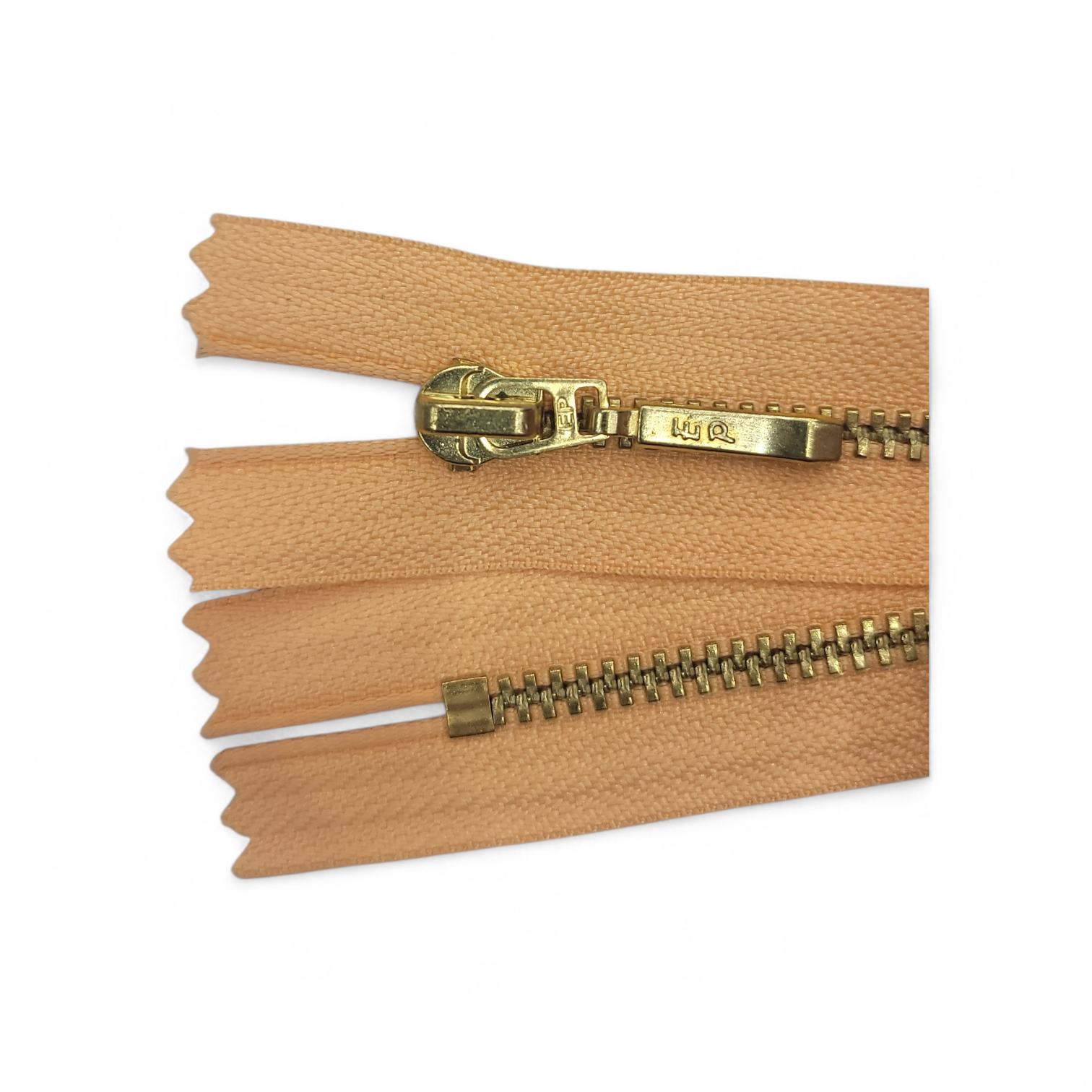 YKK size 3 closed end gold metal zip with peach tape.
