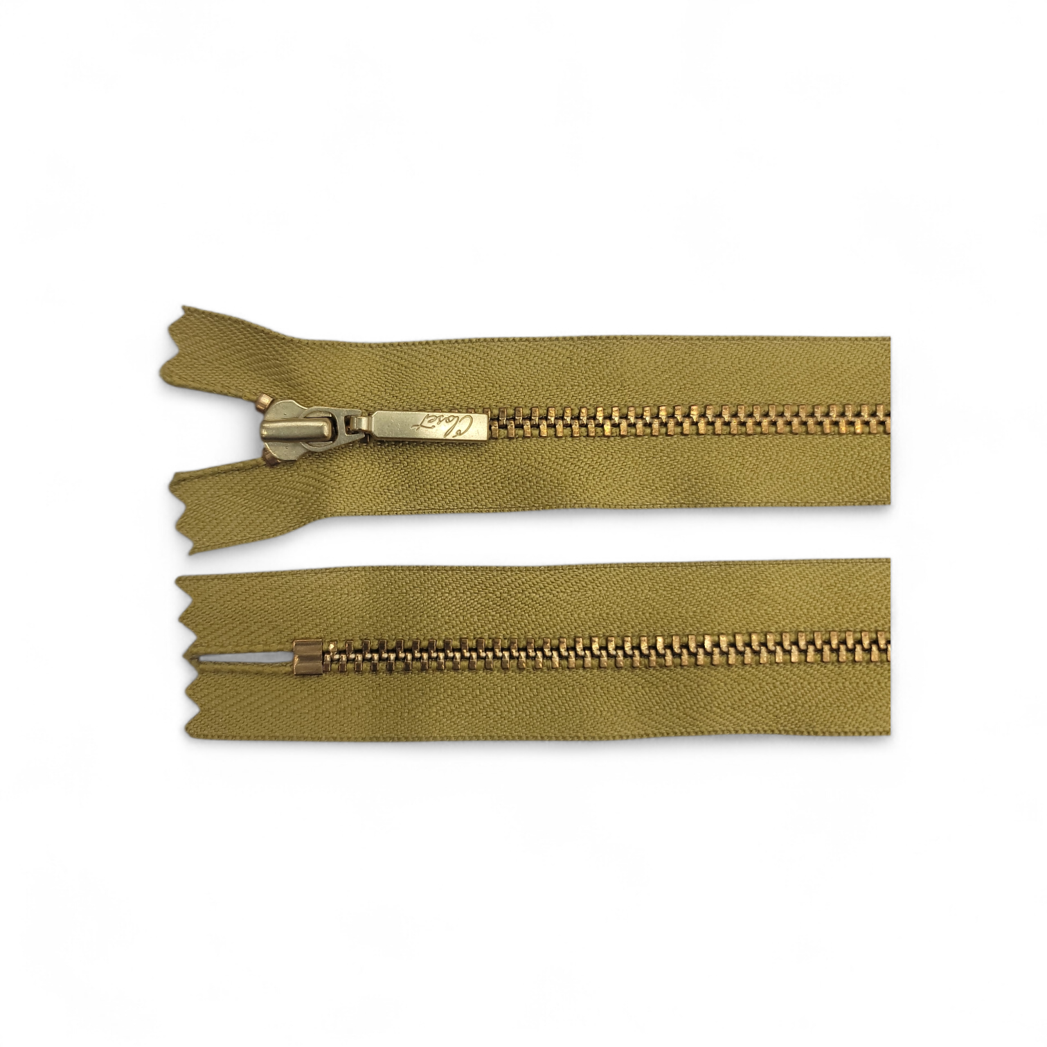 YKK size 3 closed end gold metal zipper with olive green tape.