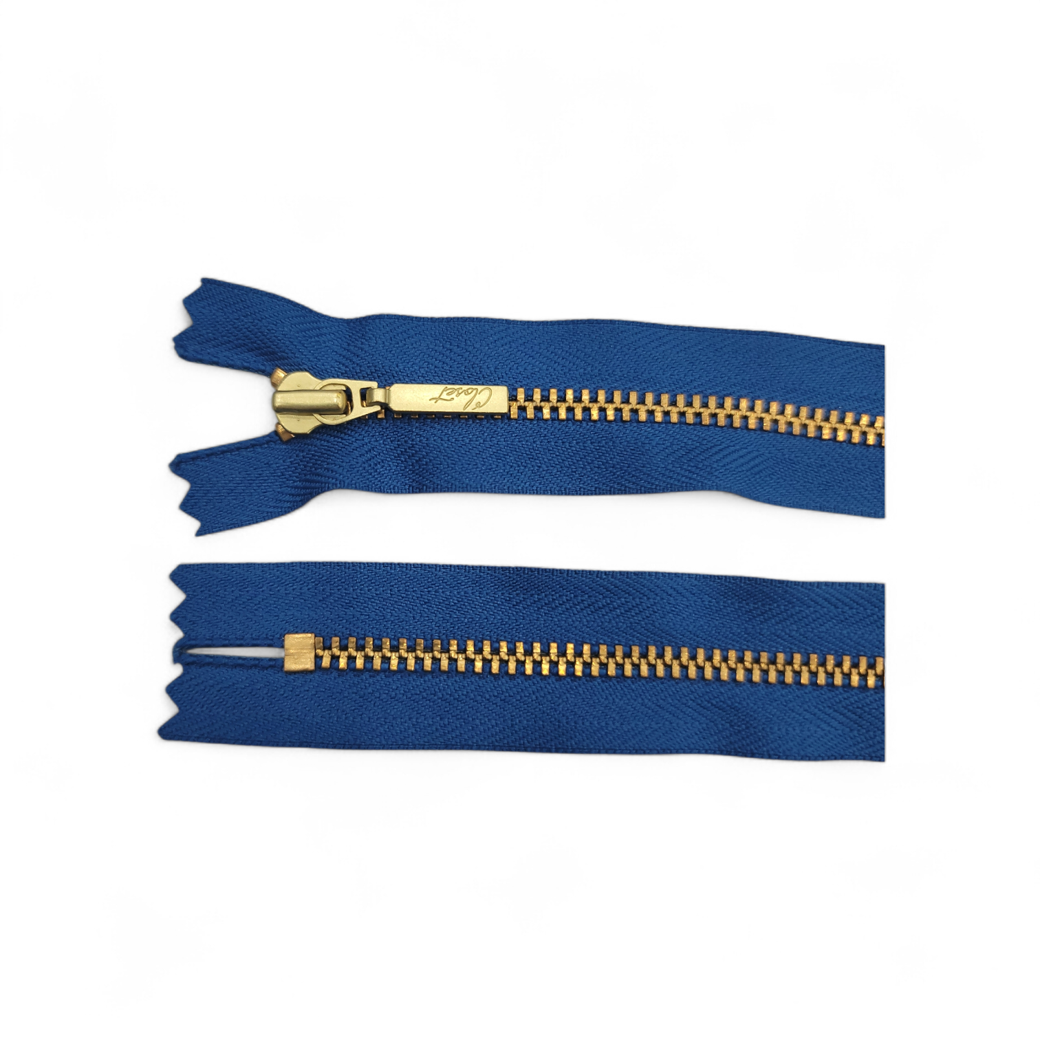 YKK size 3 closed end gold metal zipper with blue fabric.