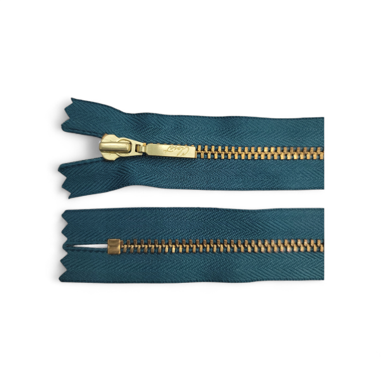YKK Size 3 closed end gold metal zip with teal fabric.