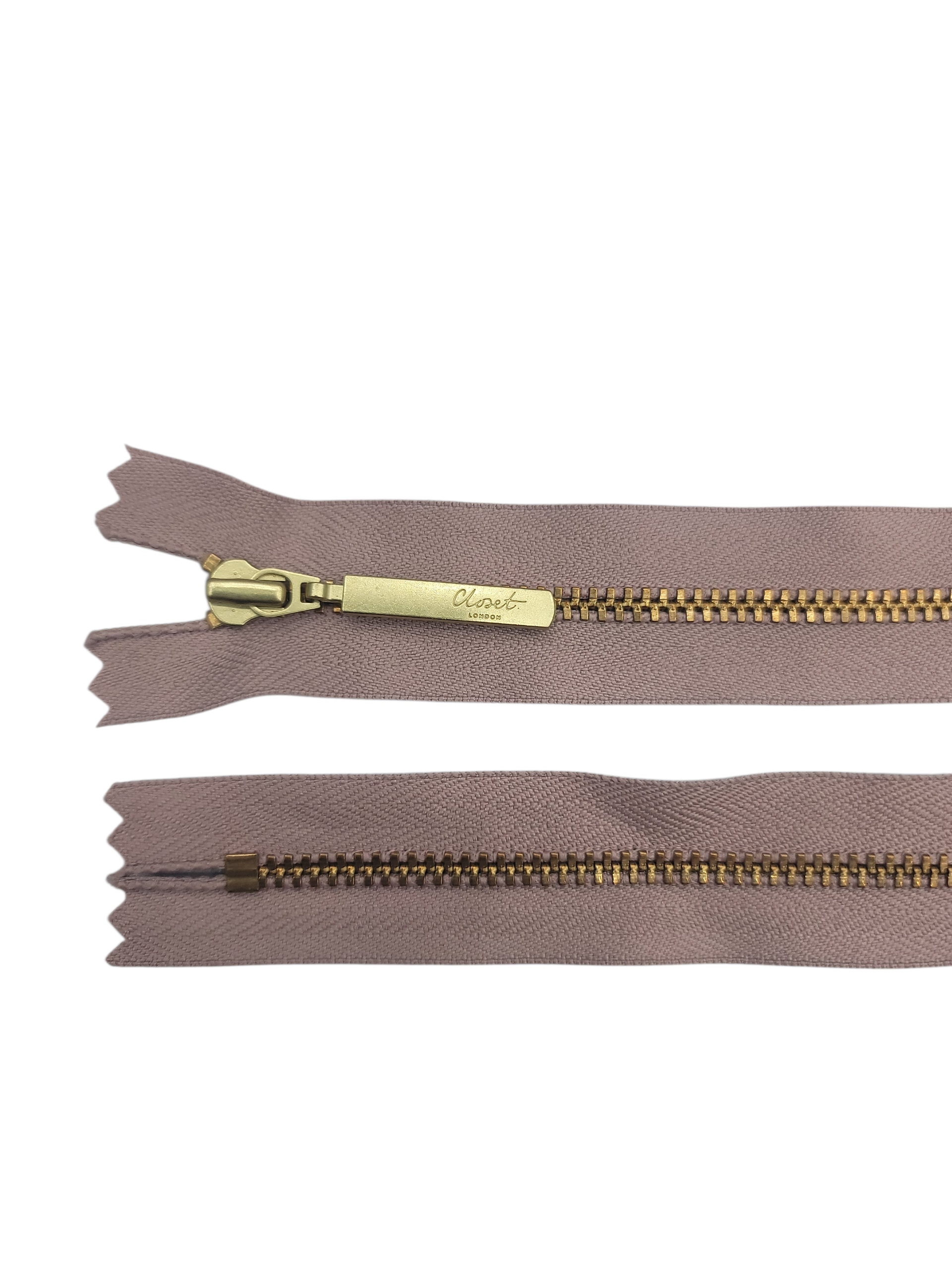 YKK size 3 closed end gold metal zip with taupe fabric.