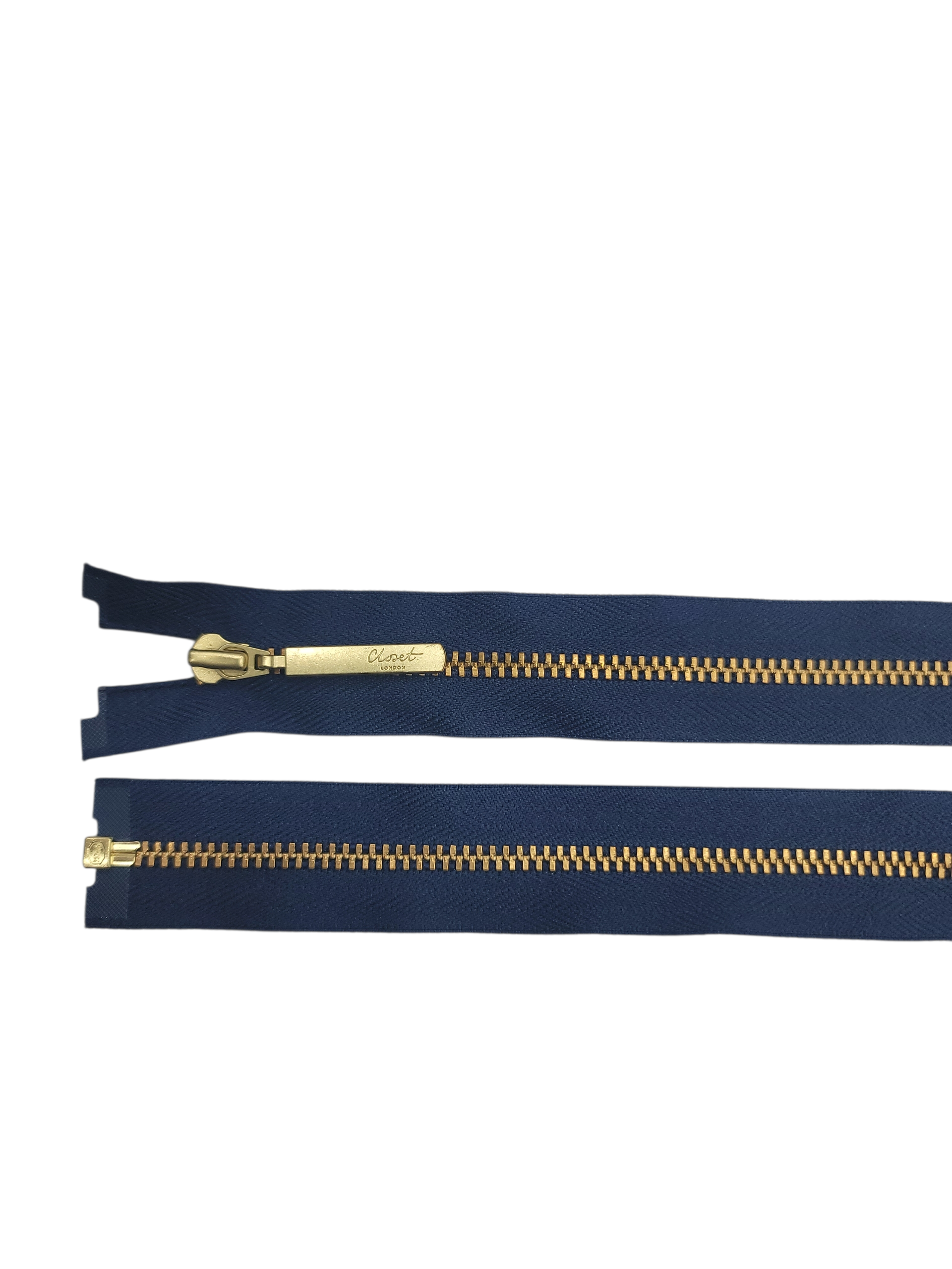 Two navy blue zippers with gold metal teeth and pulls, one with a "Closet London" logo.