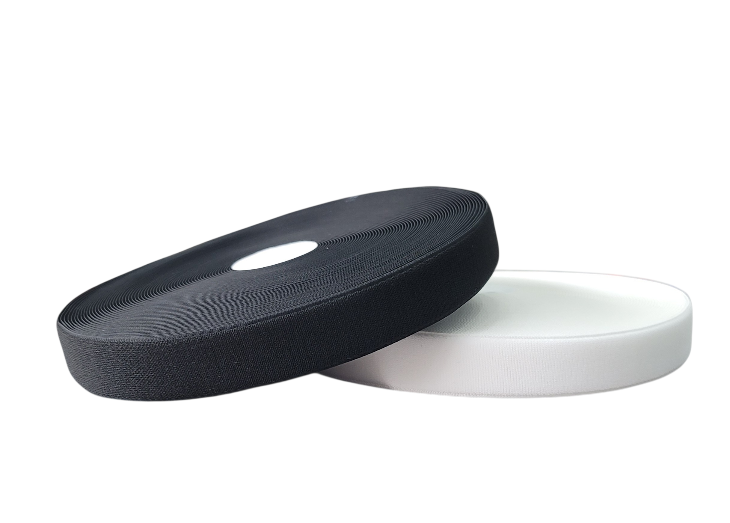 Two rolls of Marushin knit stretch tape in black and white on a plain white background.