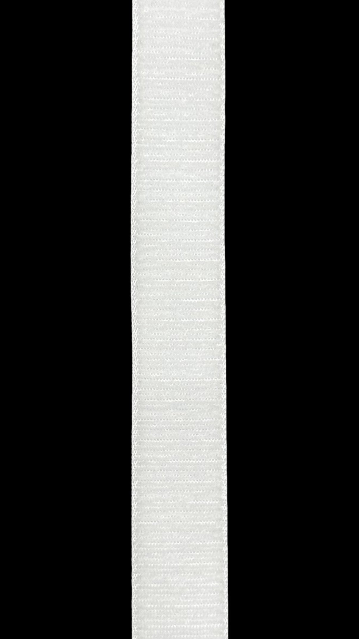 A single strip of white, super fine soft velcro tape shown vertically against a black background.