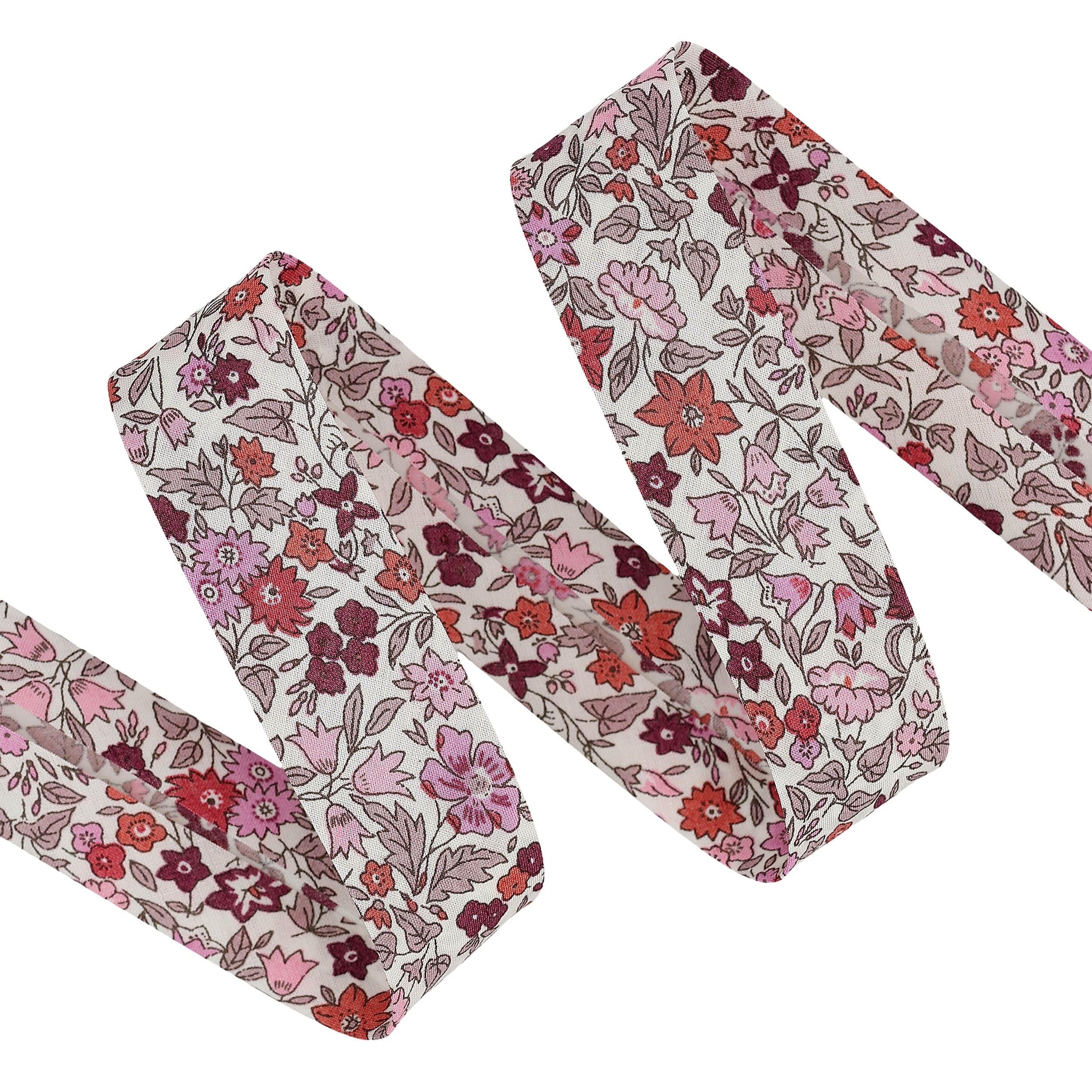 Liberty print floral bias binding in pink, red, and purple tones on a white background.