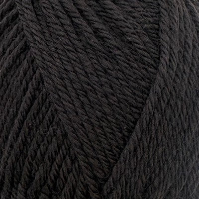 Close-up of Stylecraft Naturals Pure Wool DK yarn in black, showing its twisted fiber texture.