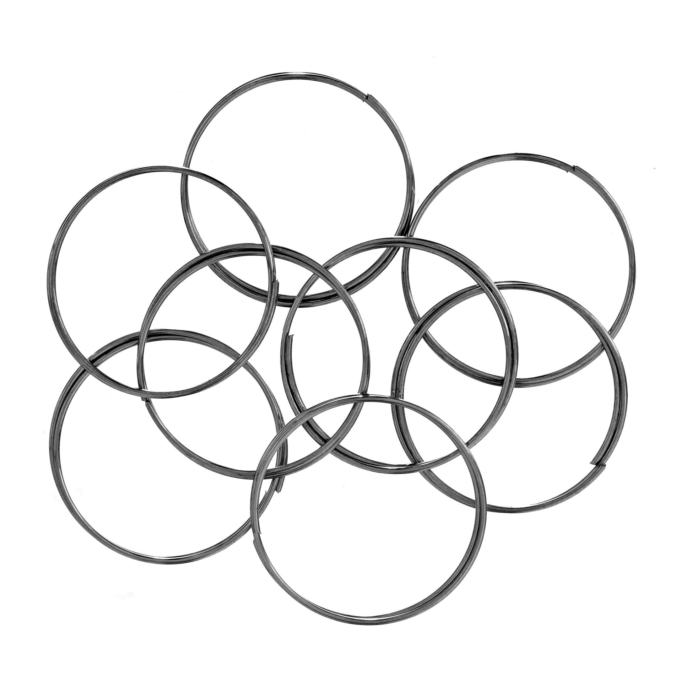 Eight coils of silver-toned memory wire for ring making, arranged in a cluster on a white background.