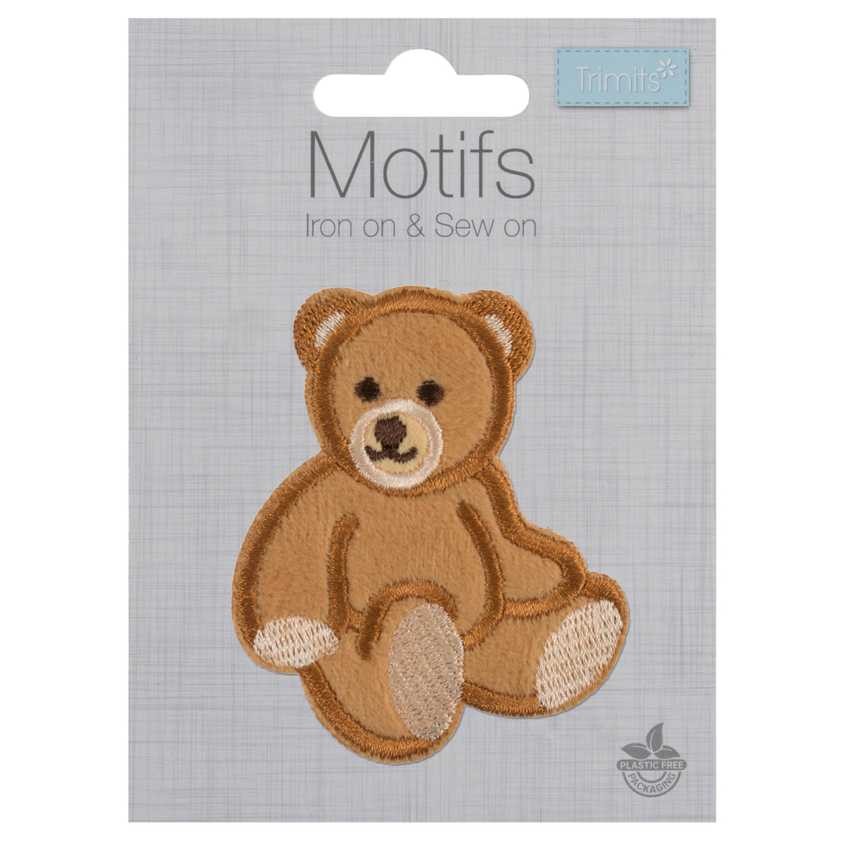 Trimits Teddy Bear iron-on and sew-on embroidered patch on grey card packaging.