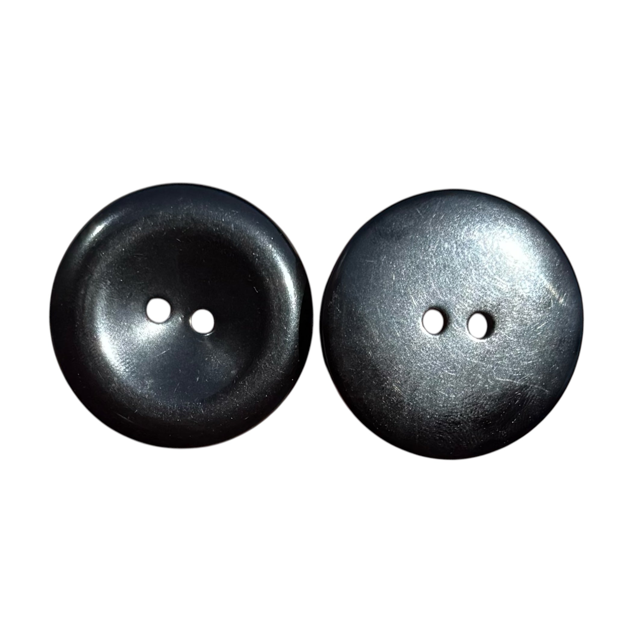 Two 35mm black resin 2-hole sewing buttons showing front and back views on a white background.