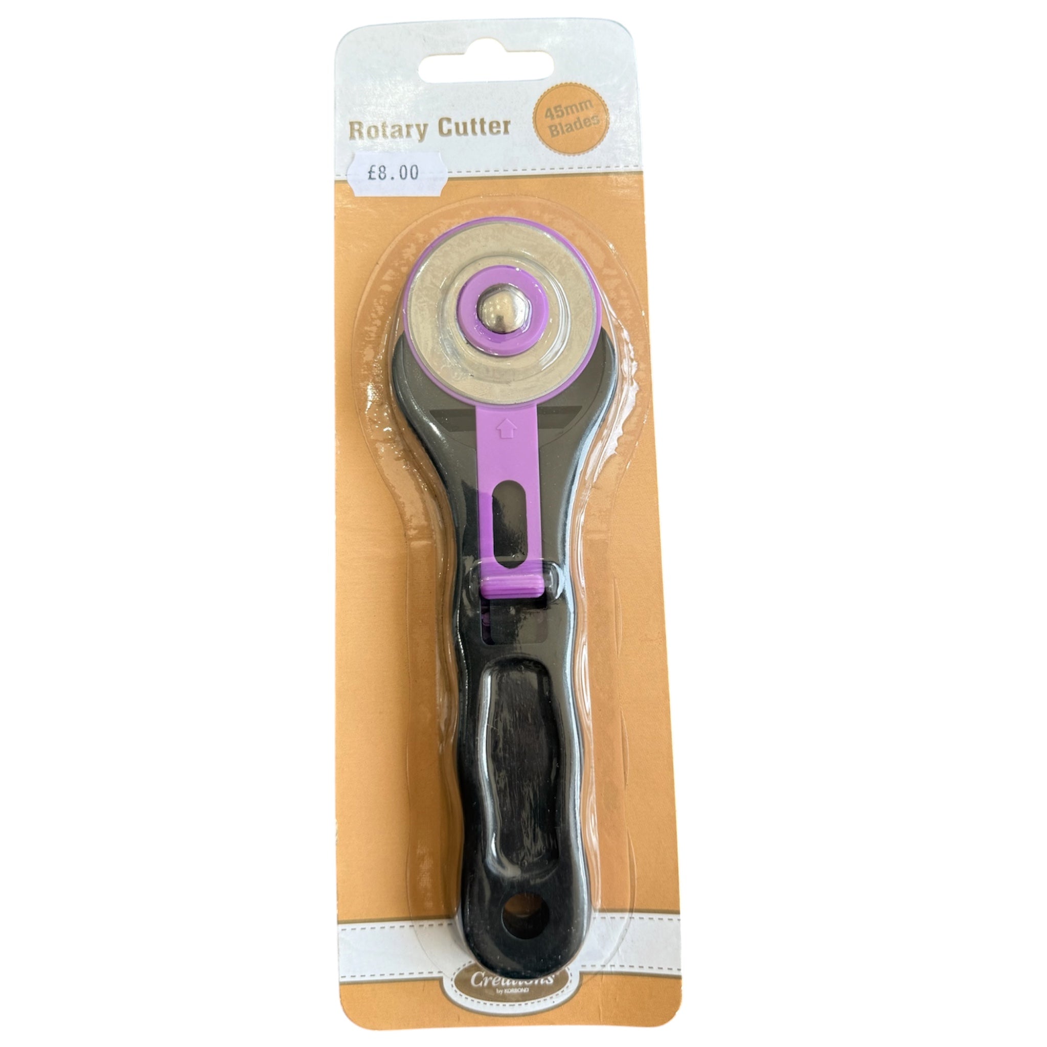 Creations rotary cutter with a 45mm blade, black handle, and purple retractable blade guard.