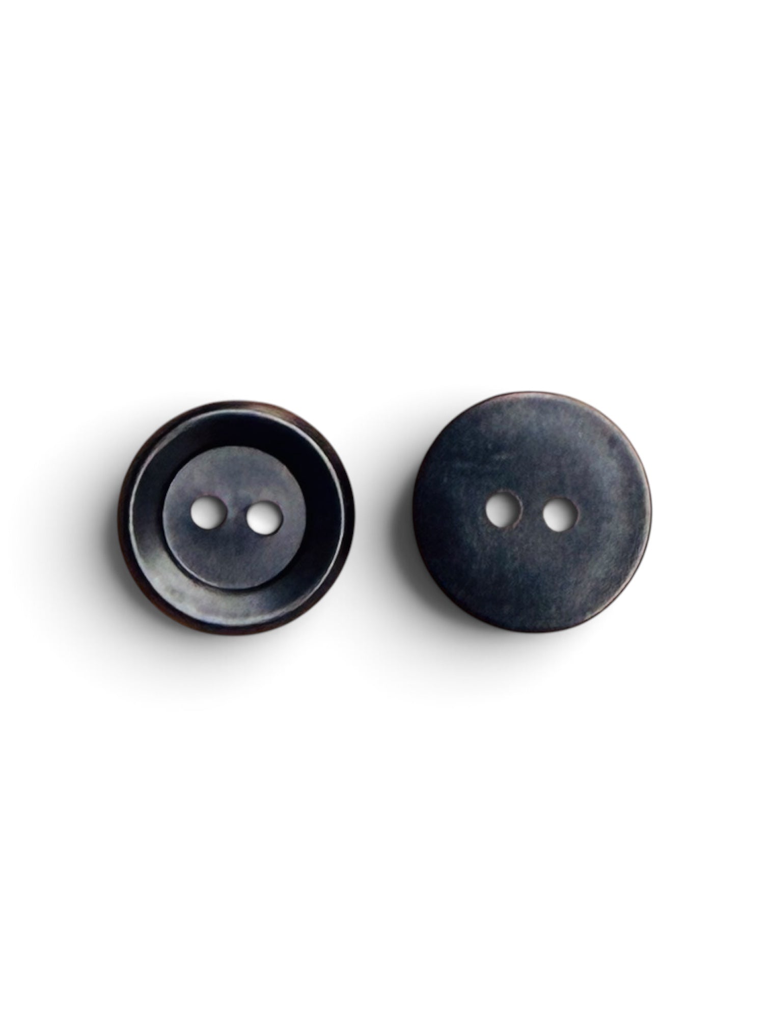 Two 13mm matte black round resin buttons with a 2-hole design on a white background.