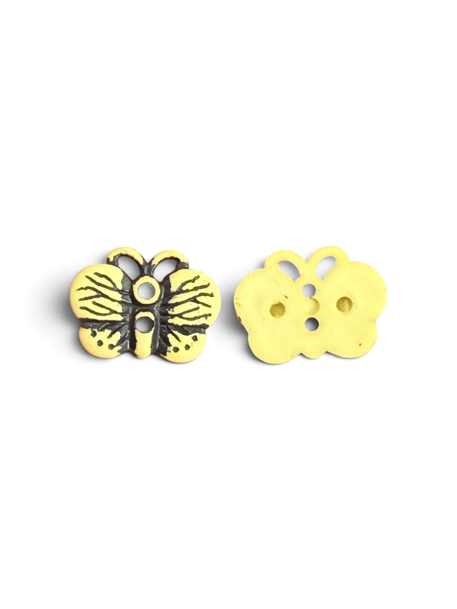 Two yellow butterfly-shaped resin buttons, one showing front detail and one showing the back.