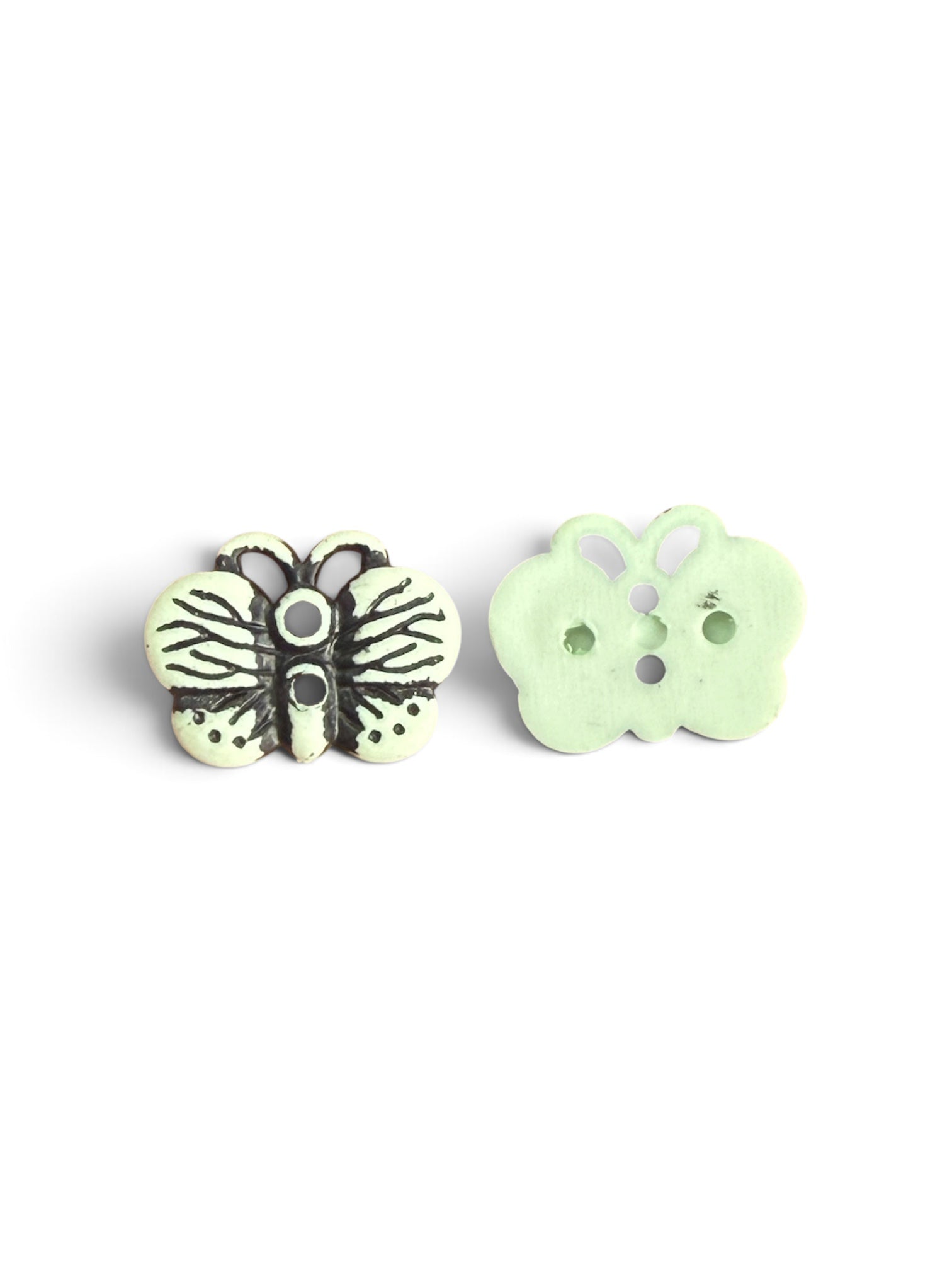 Two 17mm light green butterfly resin buttons showing the front and back with 2-hole design.