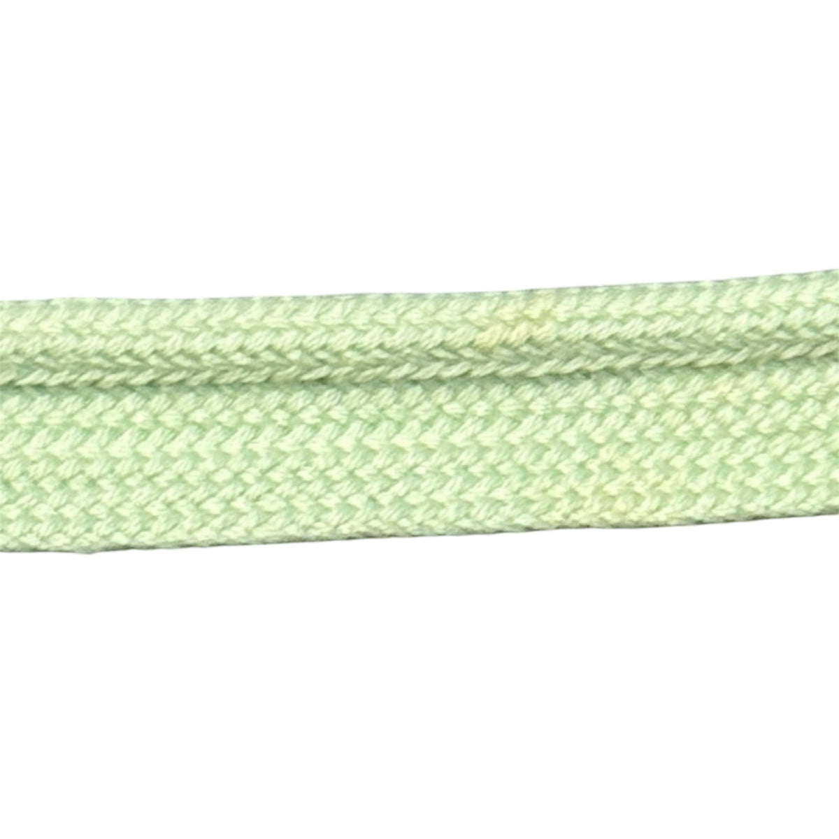Close-up of light green Shindo 100% cotton yarn-dyed piping cord, 10mm width.