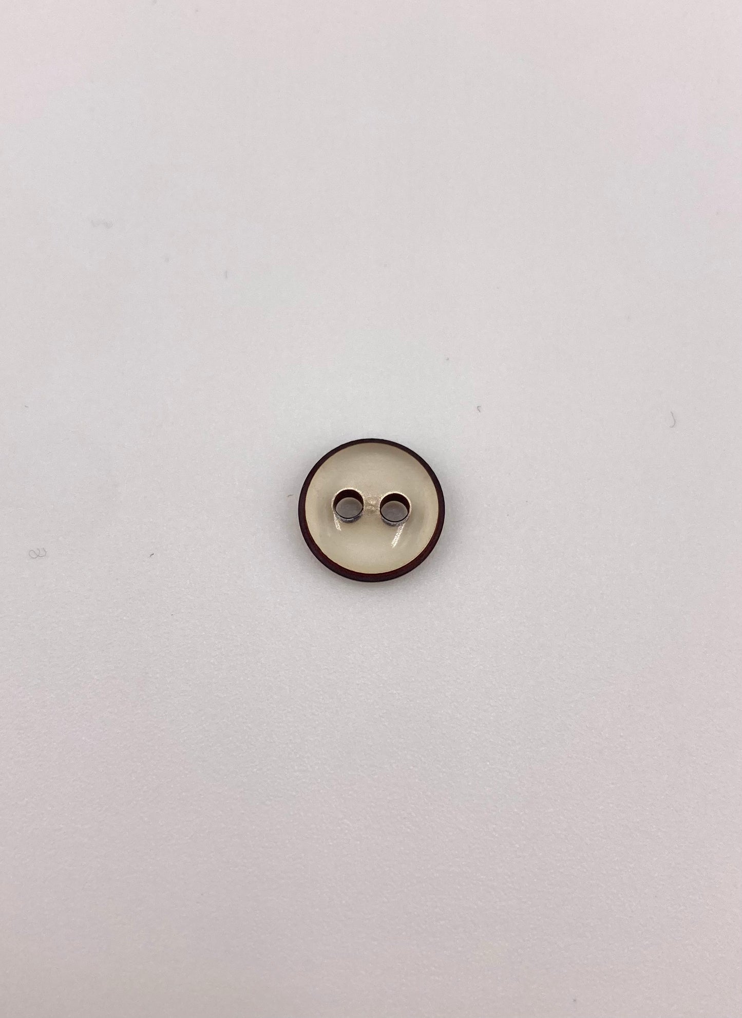 Clear Button with Dark Brown Rim, 11mm, 2-holes