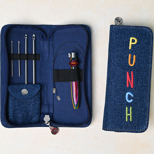 Knitpro adjustable punch needle set with wooden handle, 4 needles, and blue denim storage case.