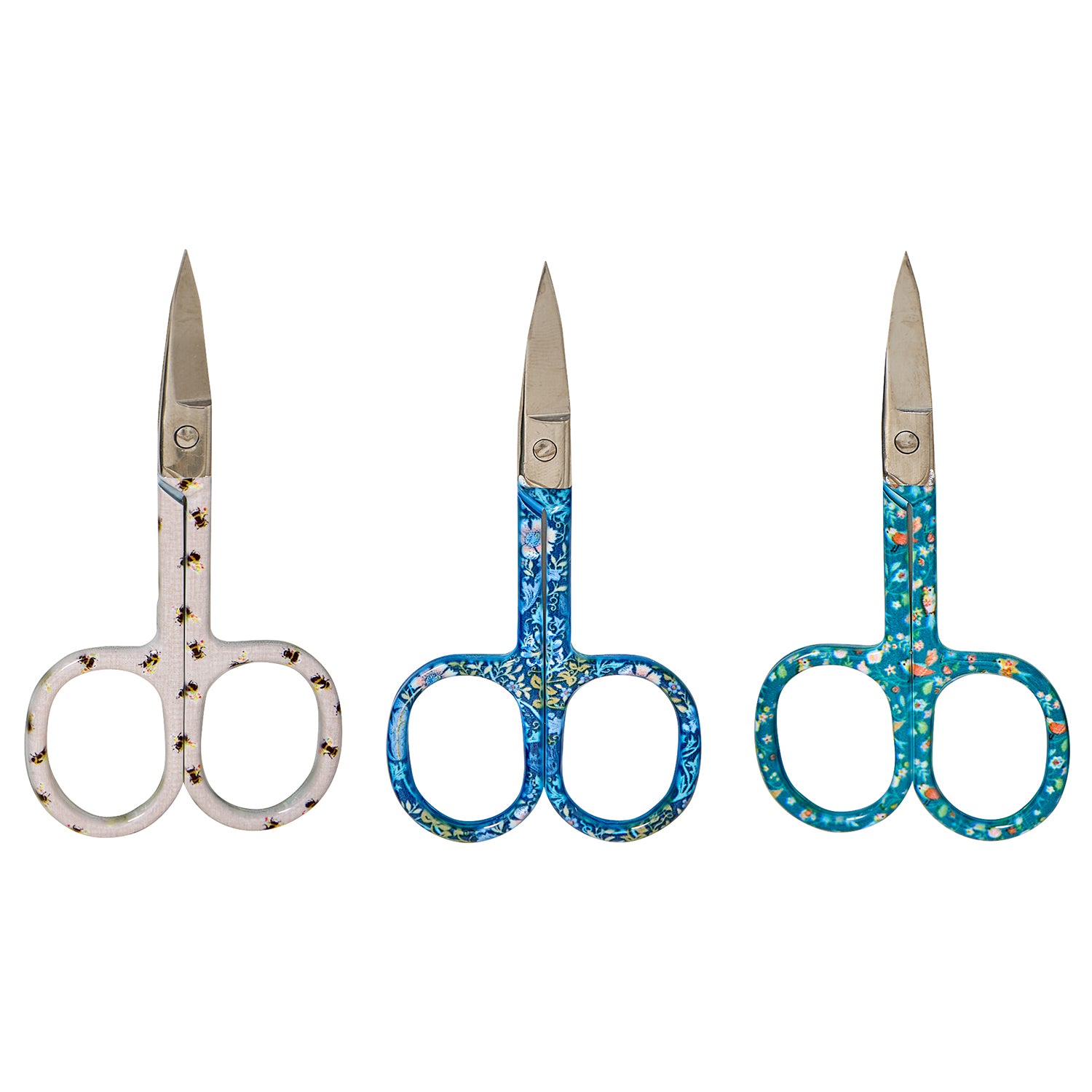 Three pairs of small embroidery scissors with different floral and bee patterns on the handles.