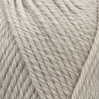 Close-up of Stylecraft Naturals Pure Wool DK yarn in the shade Parchment showing its twisted texture.