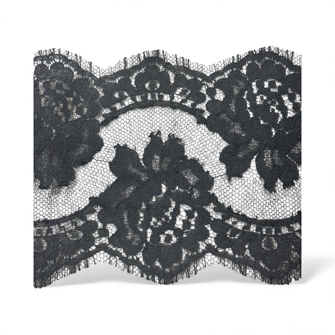 Black lace trim with a floral pattern.