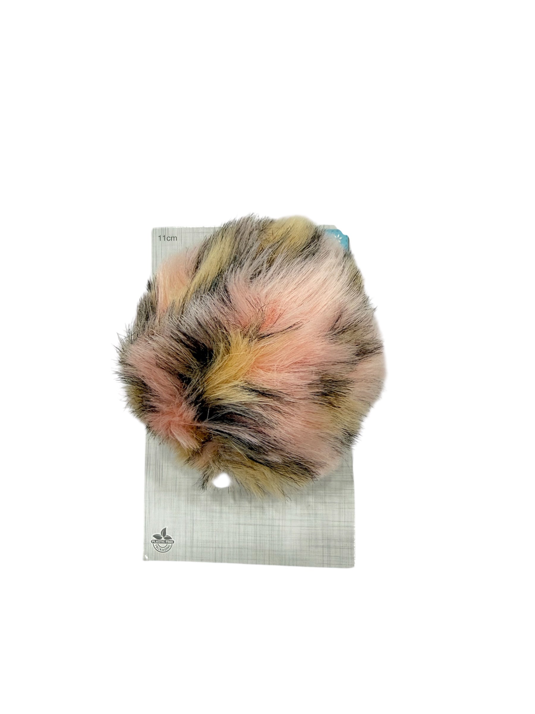 A fluffy 11cm faux fur pompom in pink, brown, and black on a grey backing card.