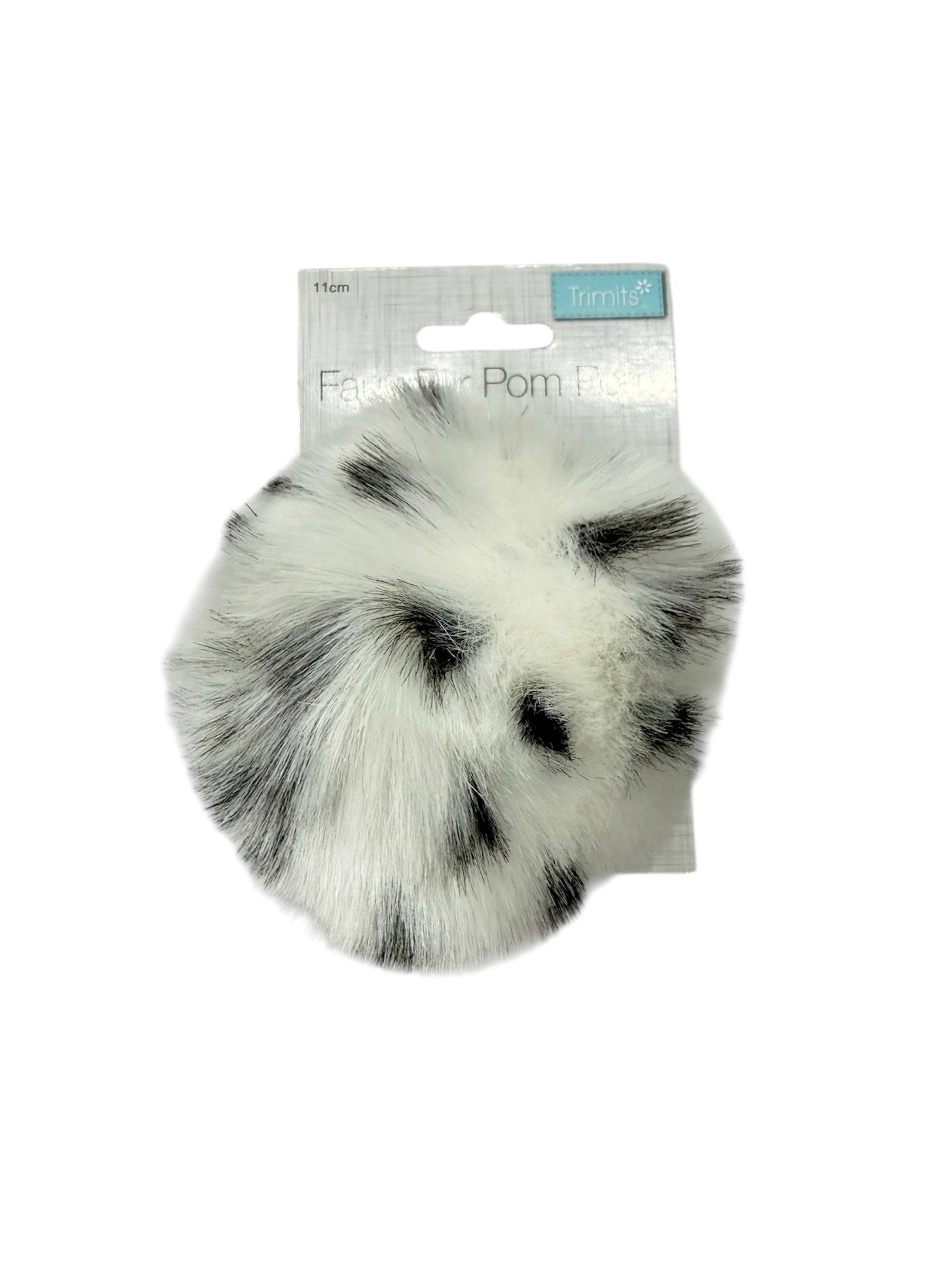 A white and black spotted faux fur pompom with a 11cm diameter.