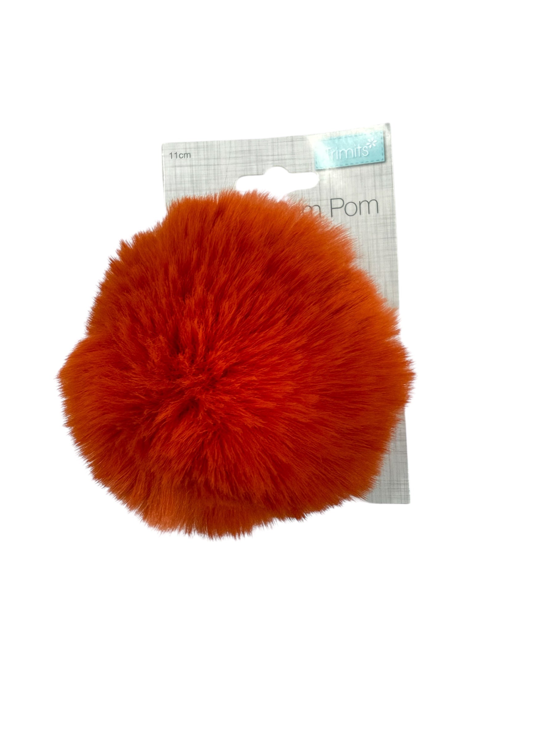 Orange faux fur pompom with 11cm label.