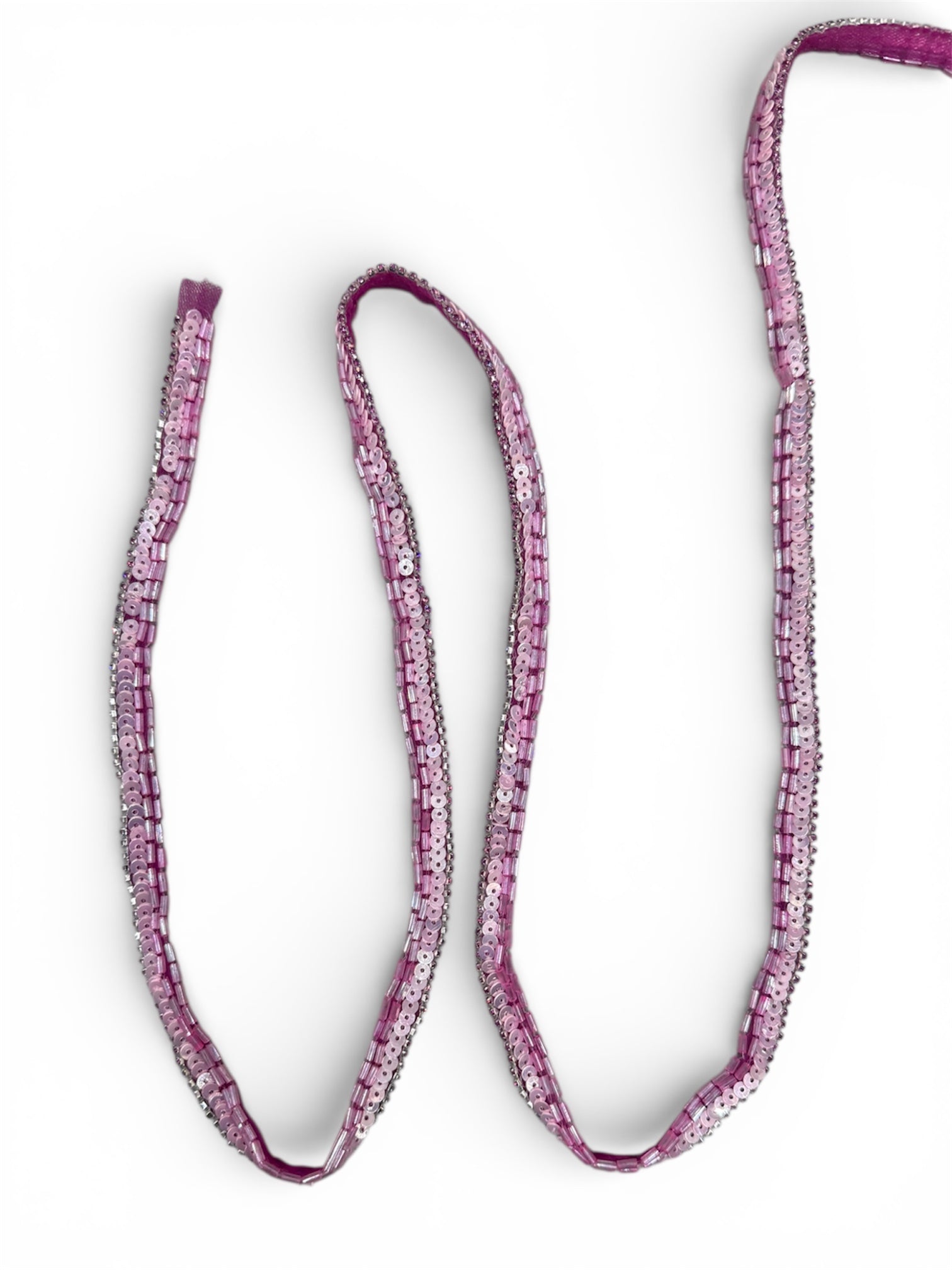 Strong pink beaded trim with sequins and small beads.