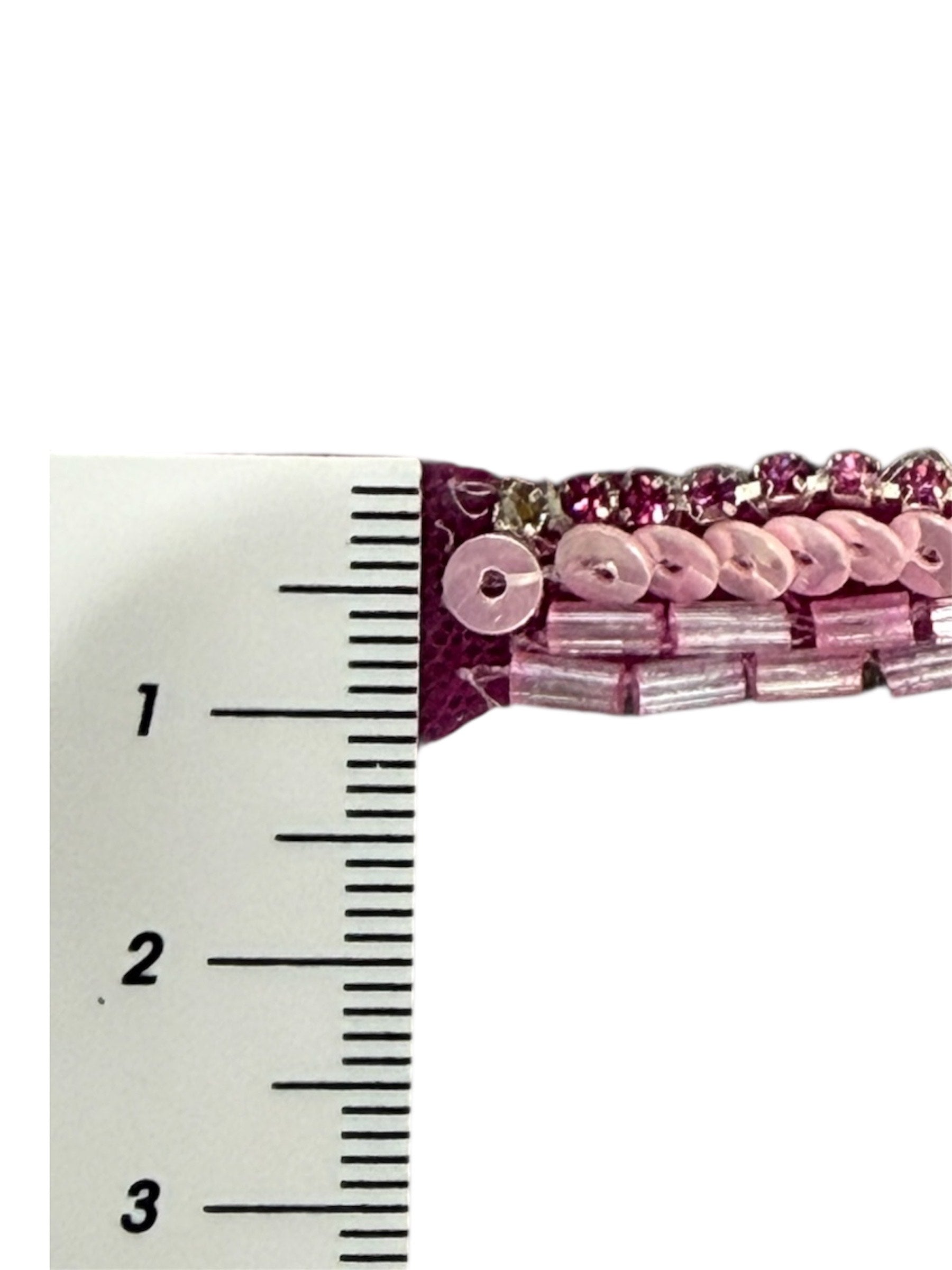 Strong pink beaded trim with sequins and tube beads.