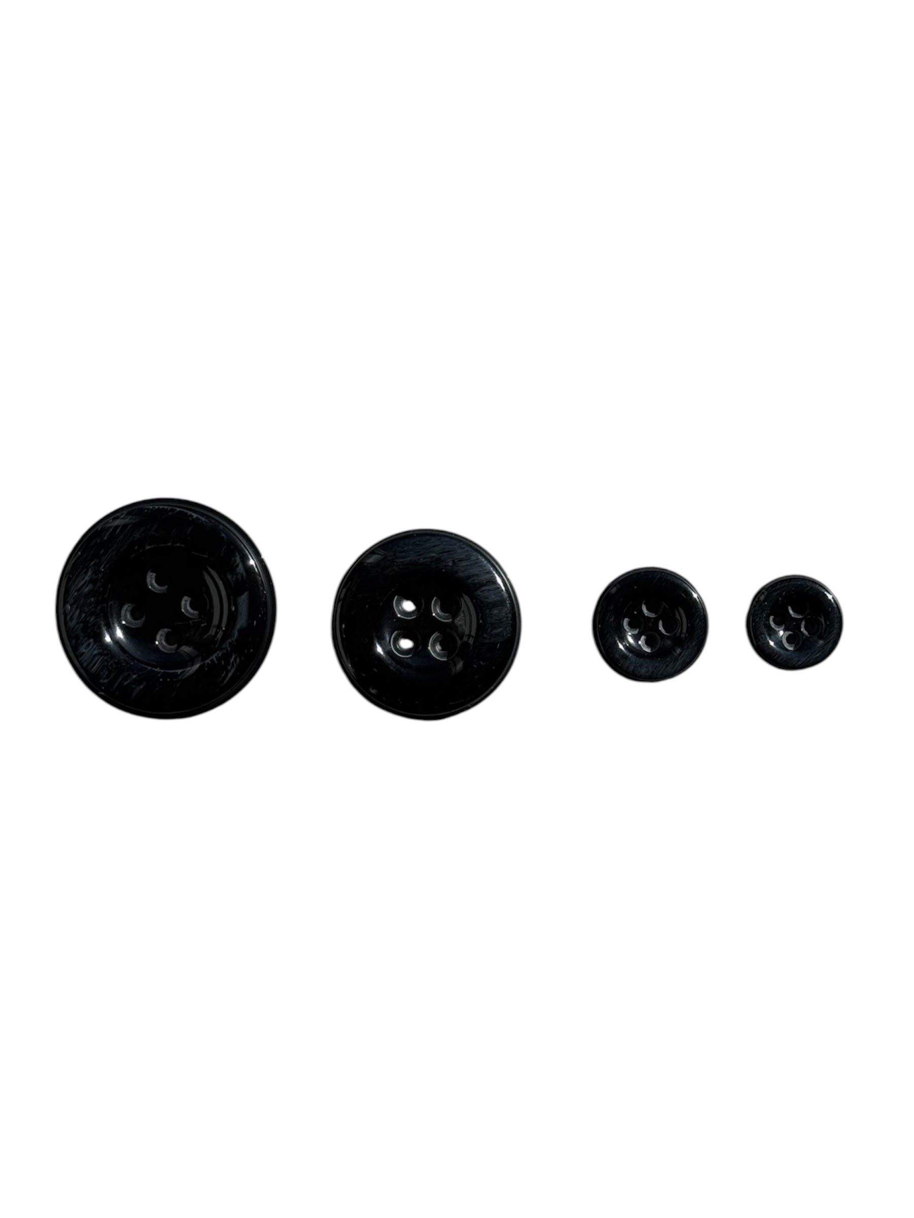 Four black, double-round sewing buttons with four holes shown in descending sizes.