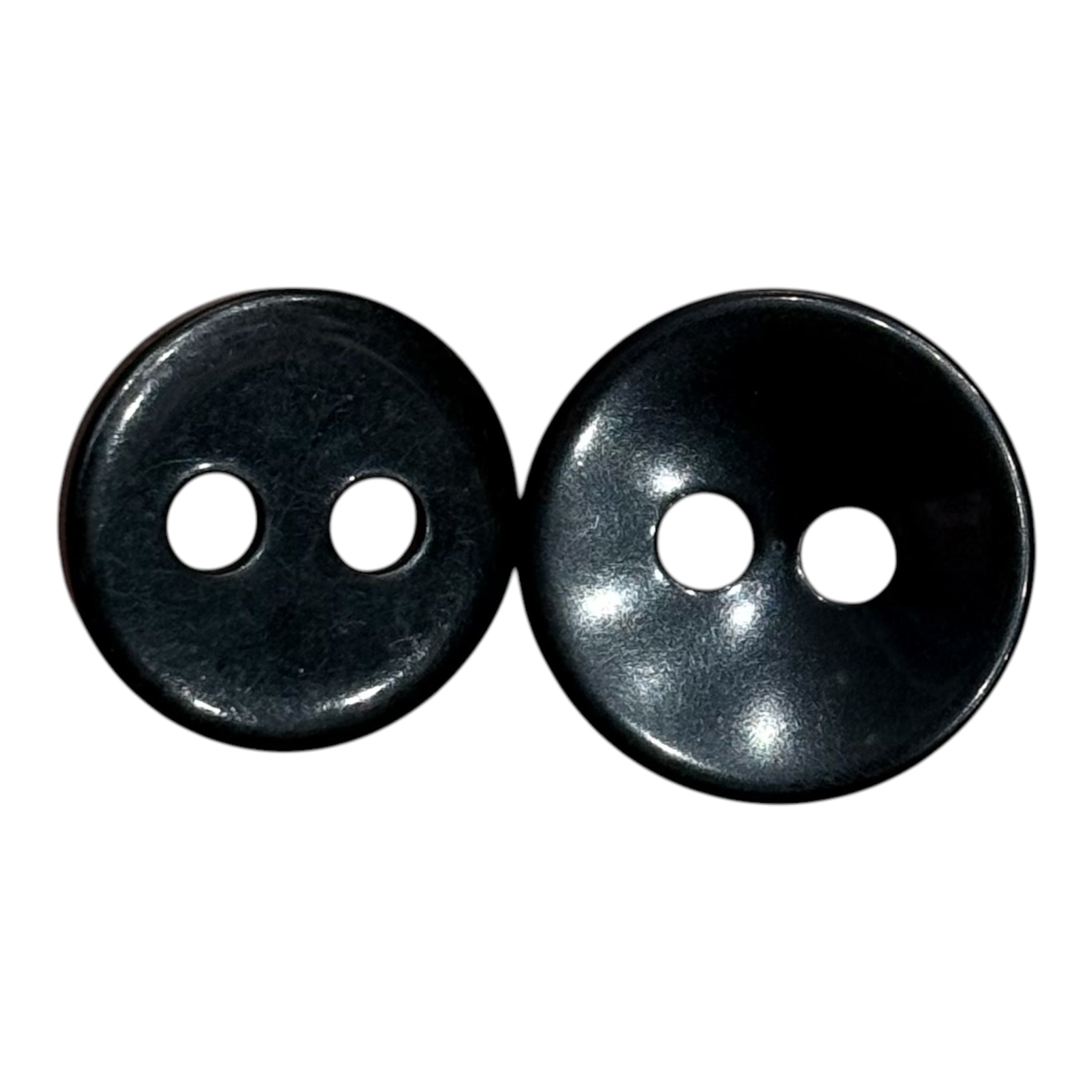 Two round black buttons with two large holes, sizes 25mm and 28mm.