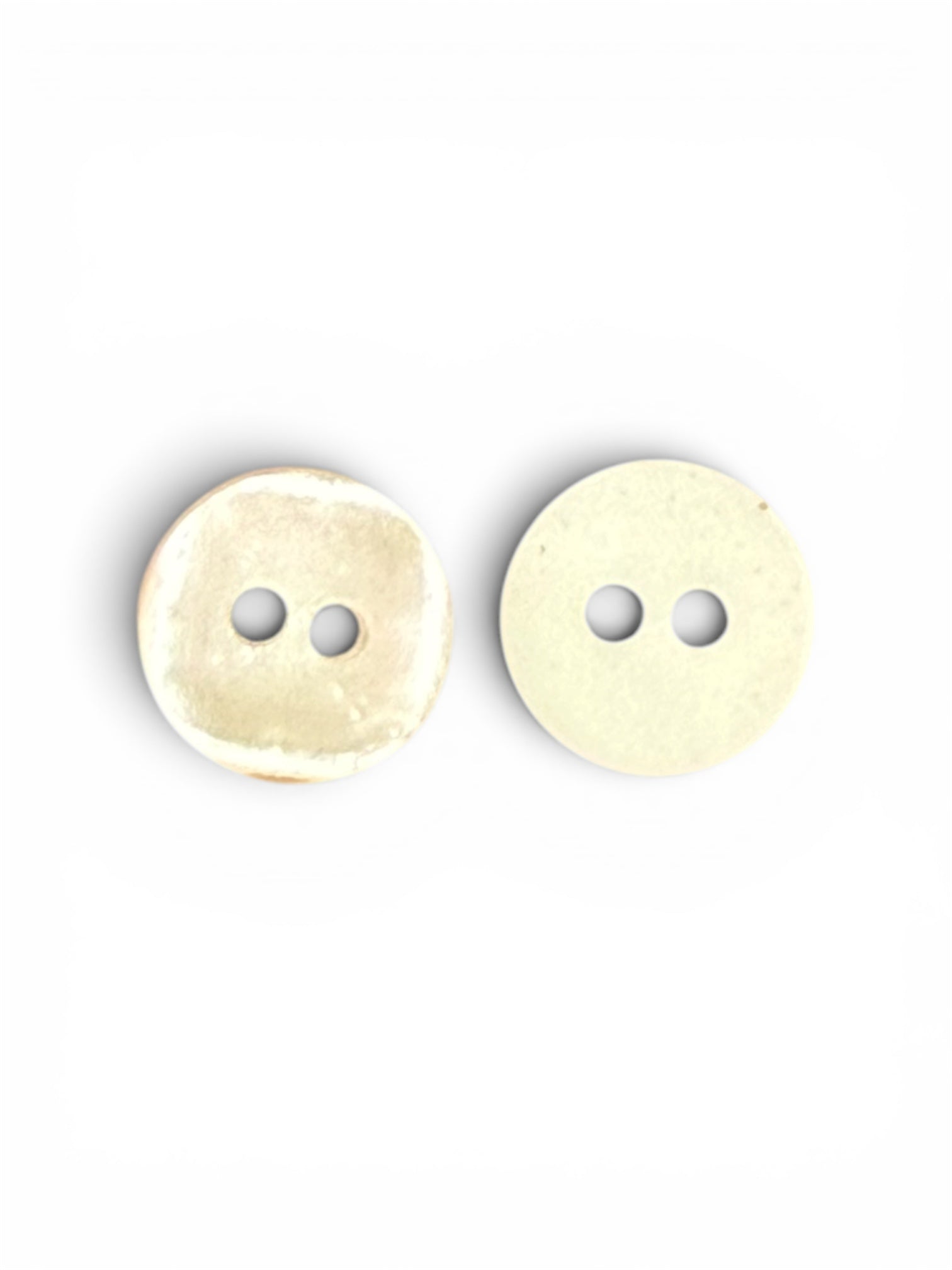 Two 12mm cream round resin buttons with a classic 2-hole design on a white background.