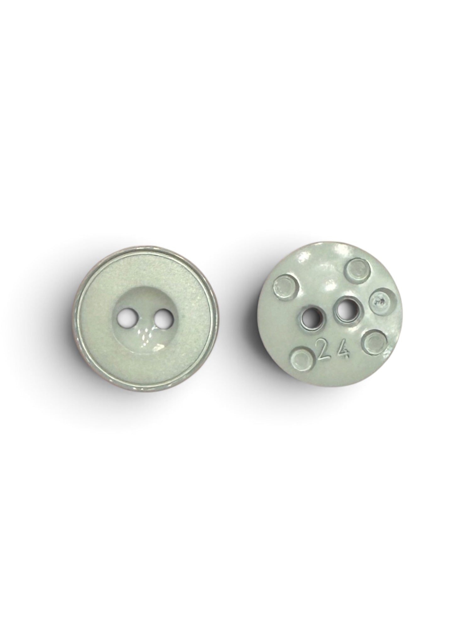 Front and back view of a 15mm light grey 2-hole button on a white background.