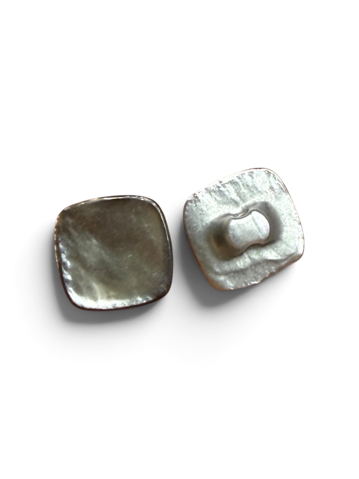 Two square grey resin sewing buttons with two holes.