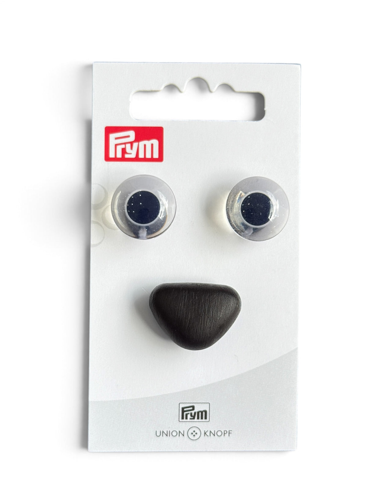 Prym animal eyes and nose set, 15mm transparent eyes and a black nose on a white card.