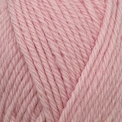 Close-up of Stylecraft Naturals Pure Wool DK yarn in Powder Pink showing twisted fiber texture.