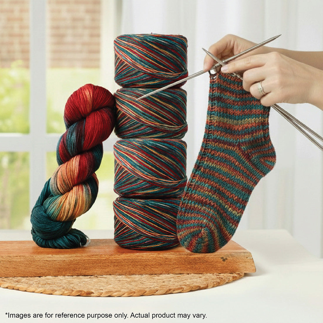 Terra 100g sock yarn in variegated colors shown as a skein, cakes, and a knitted sock.