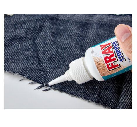 Fray Stopper fabric edge sealant being applied to denim.
