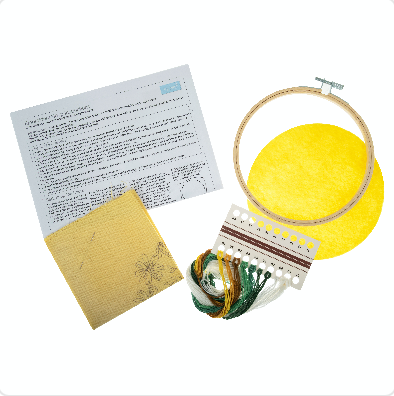 Embroidery kit for a daisy design including a hoop, threads, fabric, and instructions.