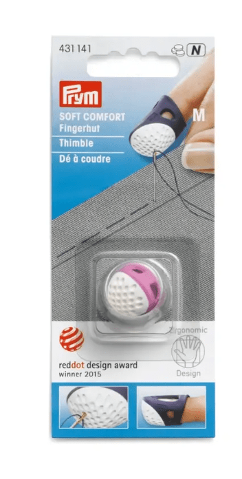 Prym Soft Comfort thimble in size M, featuring a white dimpled dome and a dark blue soft plastic shaft.