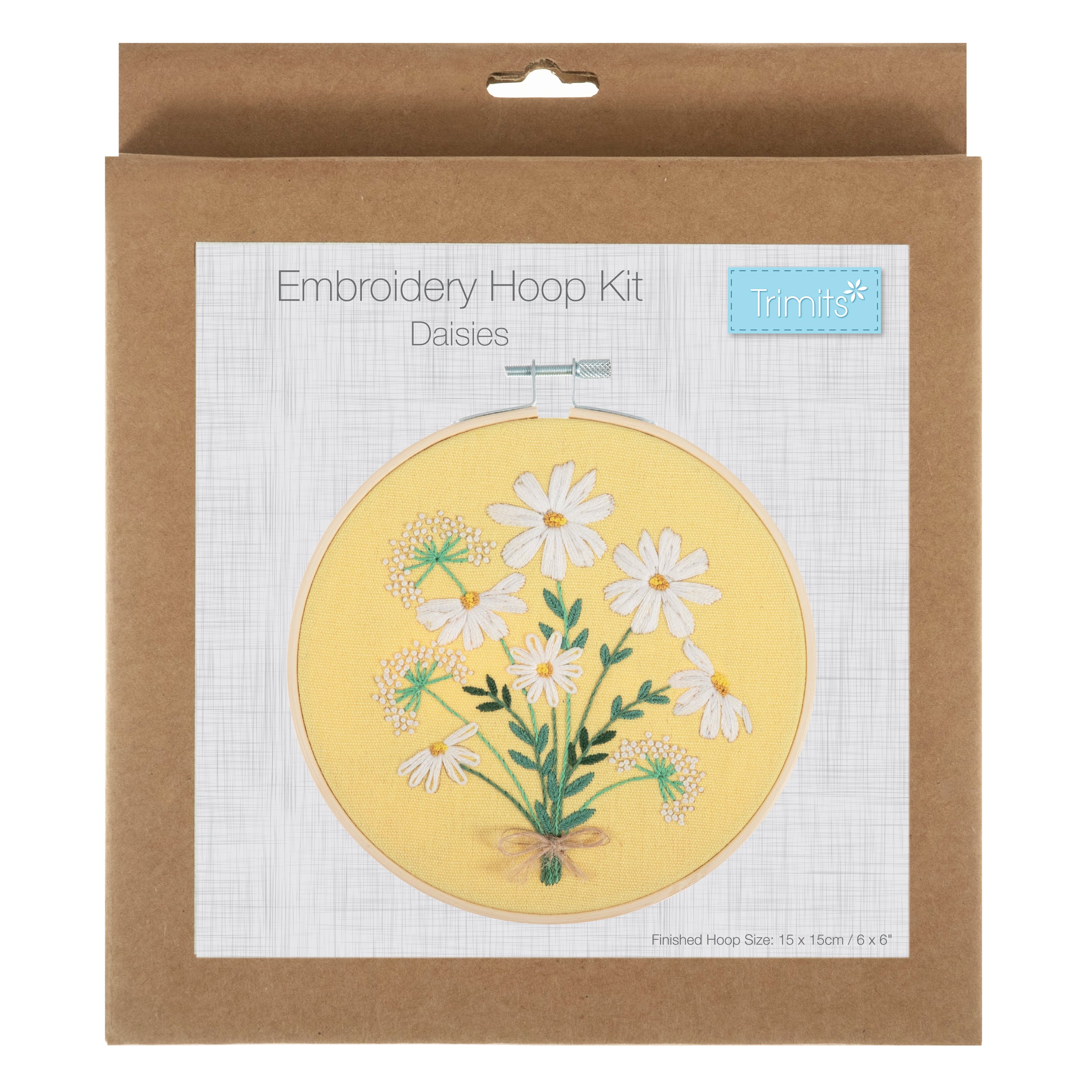 Embroidery kit with hoop featuring a pre-printed daisy bouquet design on yellow fabric.