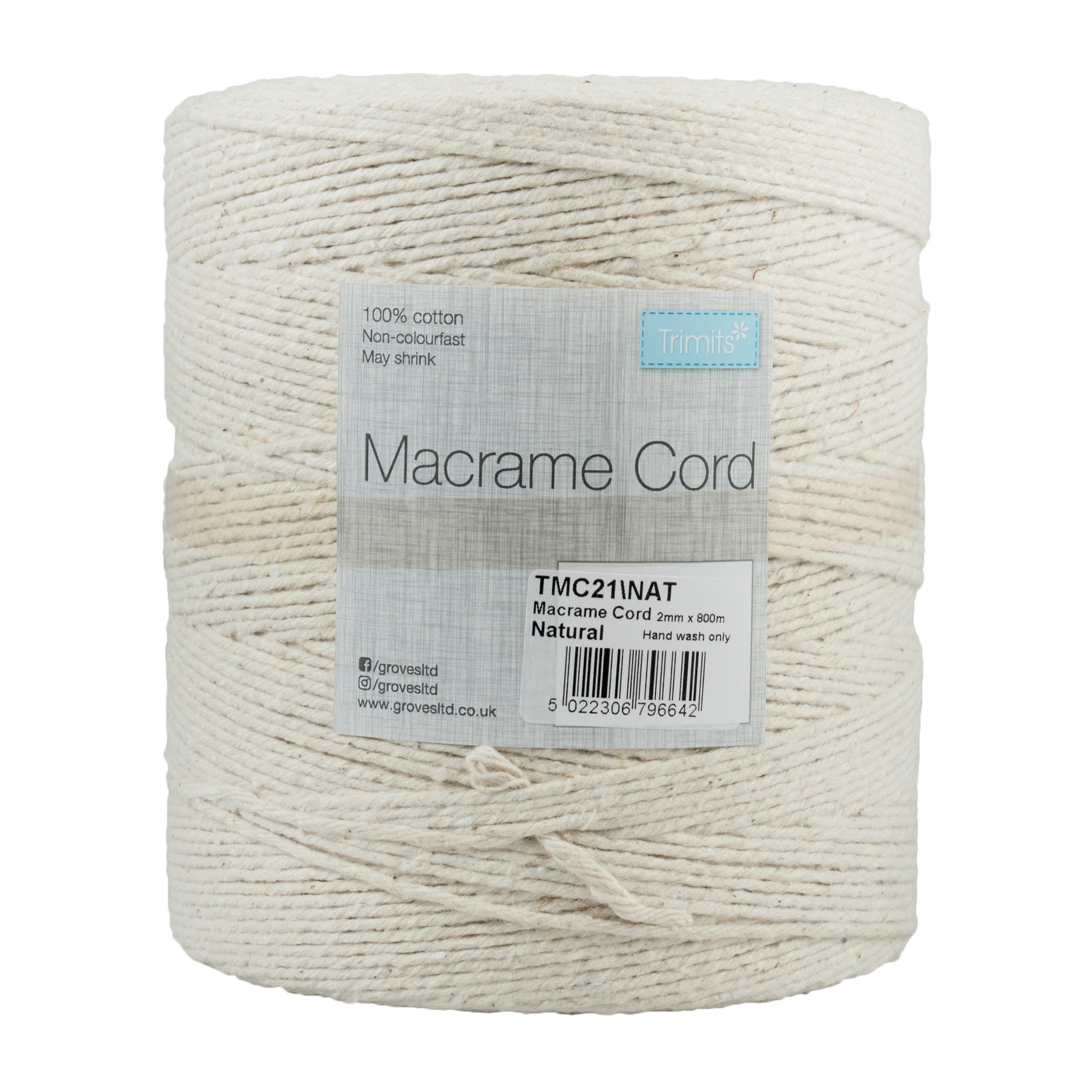 A large spool of natural white 100% cotton macramé cord with a Trimits brand label.