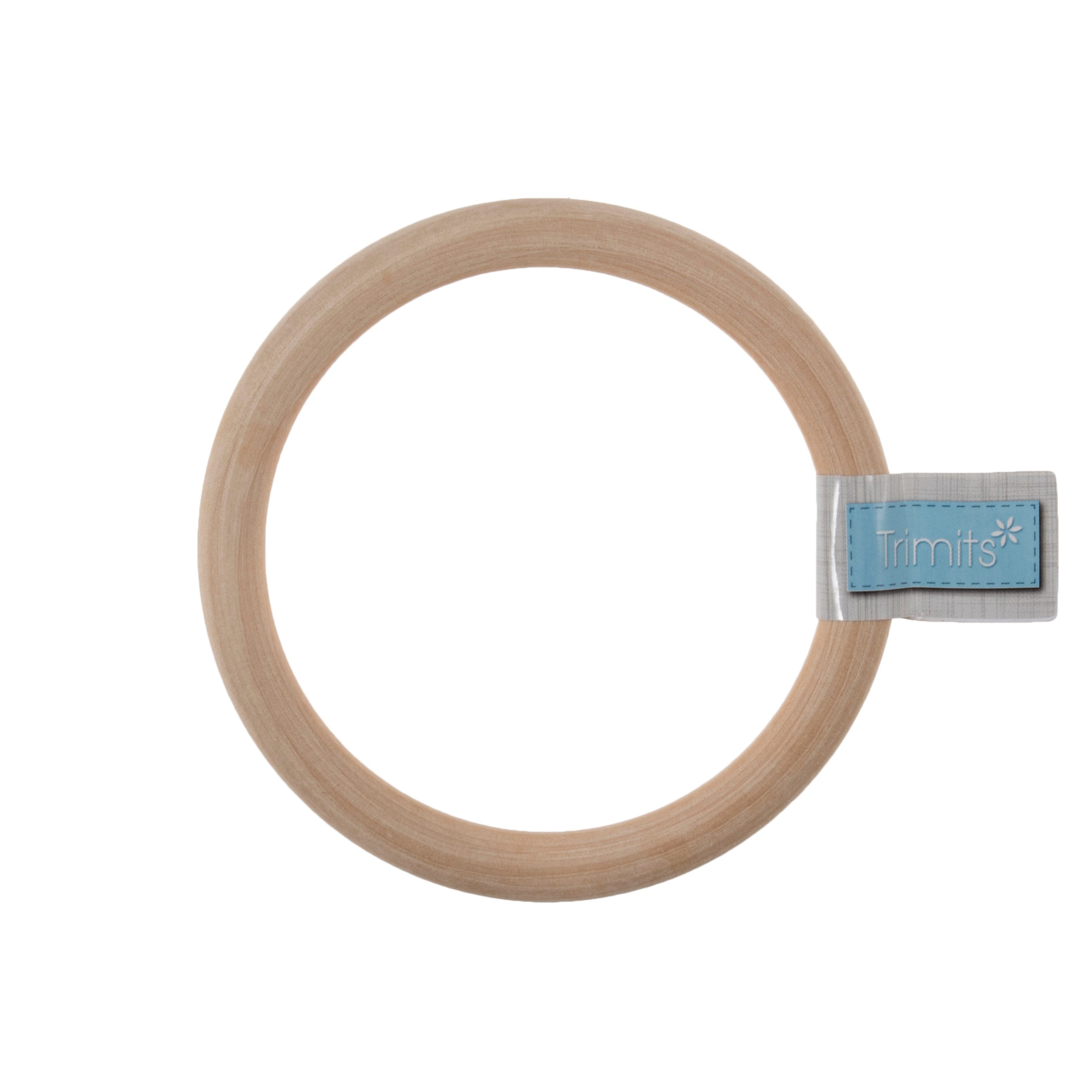 A smooth, circular birch wood craft ring with a blue Trimits brand label on a white background.