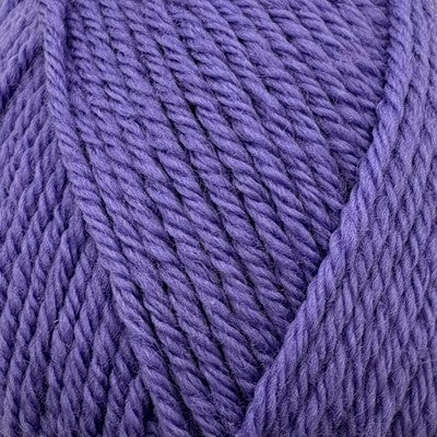 Close-up of Stylecraft Naturals Pure Wool DK yarn in a vibrant violet purple shade.